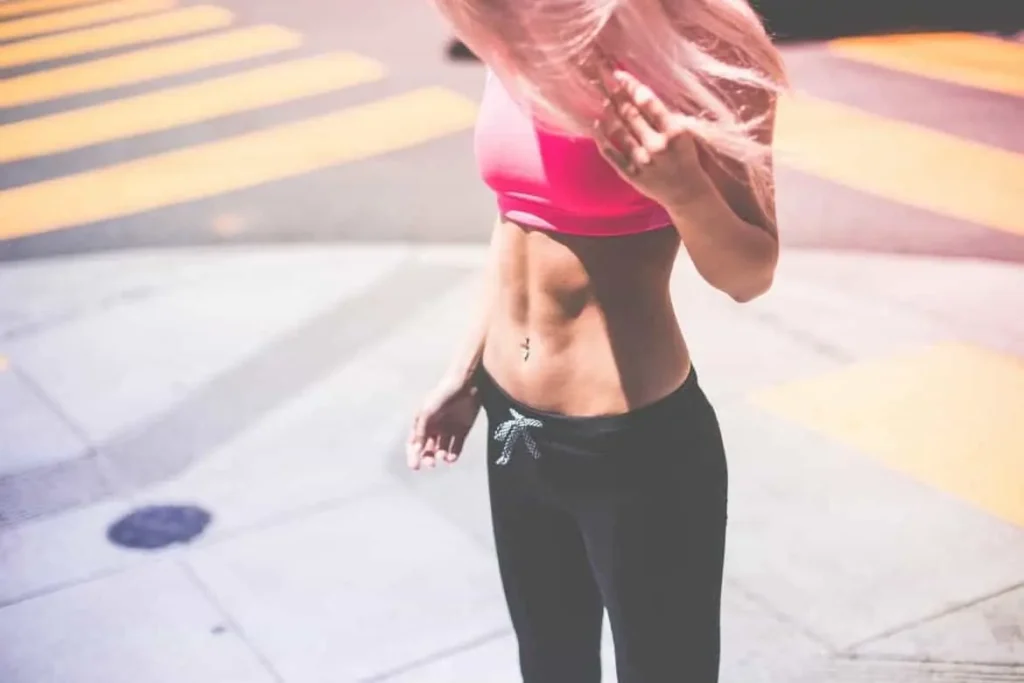 Woman with toned stomach after LA-EMS Body Sculpting Treatment Sale